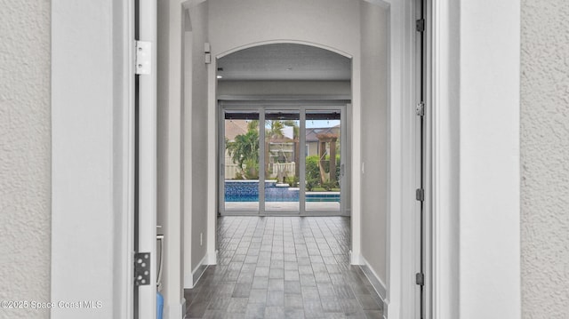 3110 Addison Dr, Melbourne, FL 32940 - hallway with arched walkways