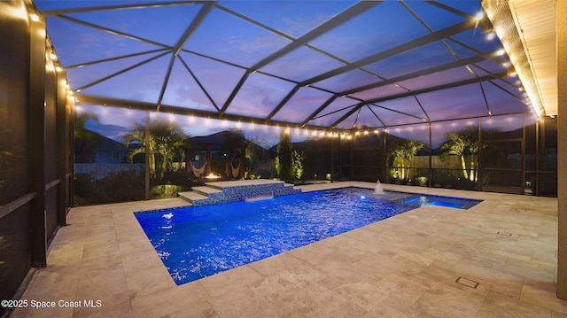 3110 Addison Dr, Melbourne, FL 32940 - view of swimming pool featuring a patio area, a pool with connected hot tub, and a lanai