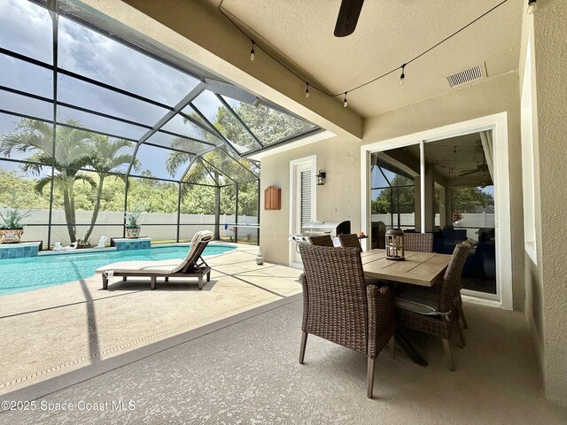 4569 Chastain Dr, Melbourne, FL 32940 - view of patio / terrace with a ceiling fan and glass enclosure