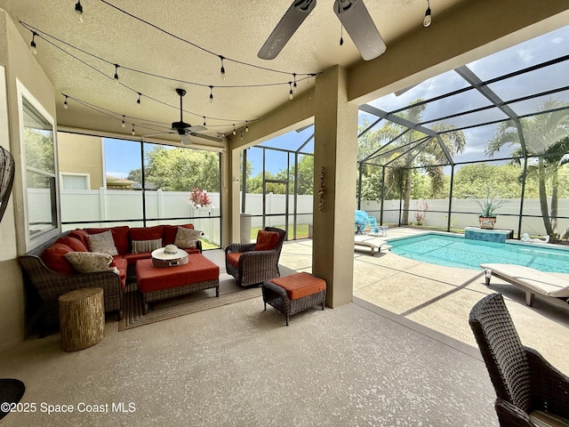 4569 Chastain Dr, Melbourne, FL 32940 - view of swimming pool with a ceiling fan, an outdoor living space, a fenced backyard, and a patio