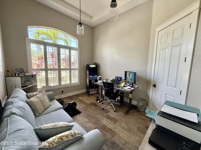 4569 Chastain Dr, Melbourne, FL 32940 - office area featuring baseboards and wood finished floors