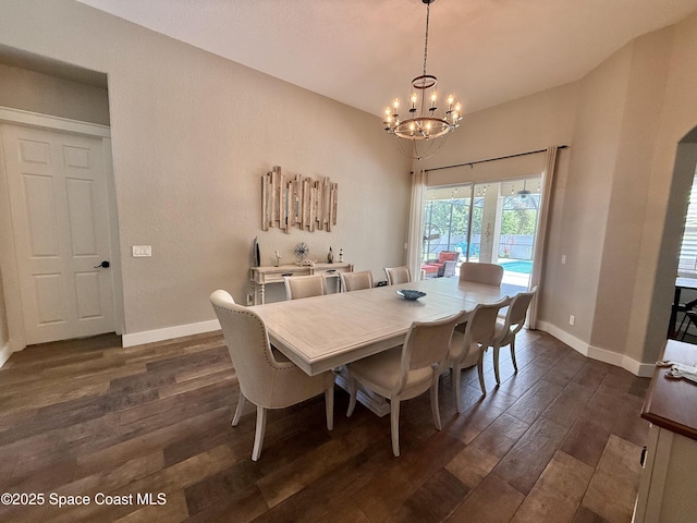 4569 Chastain Dr, Melbourne, FL 32940 - dining room featuring dark wood-type flooring and a chandelier