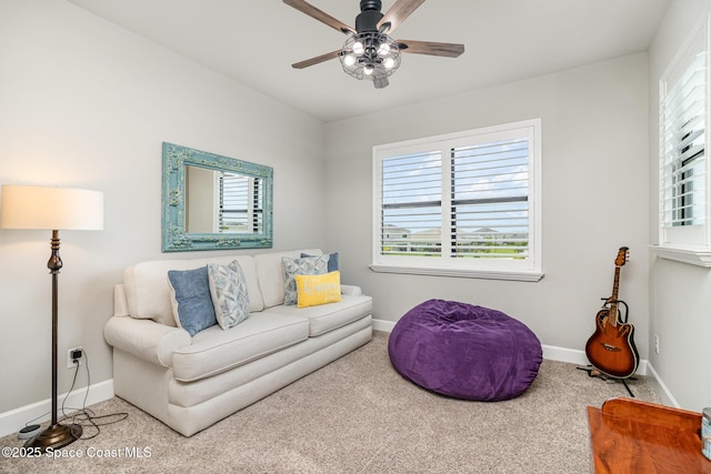 3243 Casare Dr, Melbourne, FL 32940 - living room with a ceiling fan and carpet flooring