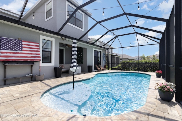 3243 Casare Dr, Melbourne, FL 32940 - outdoor pool with a patio area, a lanai, and a ceiling fan