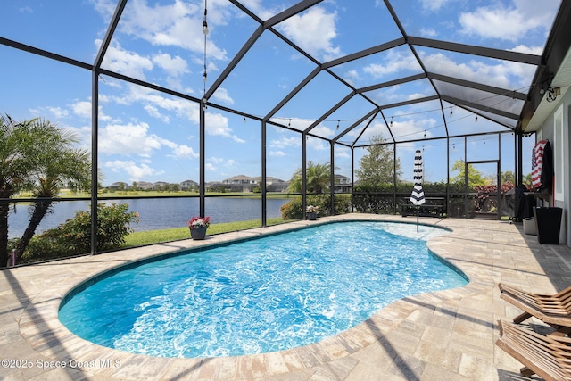 3243 Casare Dr, Melbourne, FL 32940 - swimming pool with a patio area, a water view, and glass enclosure