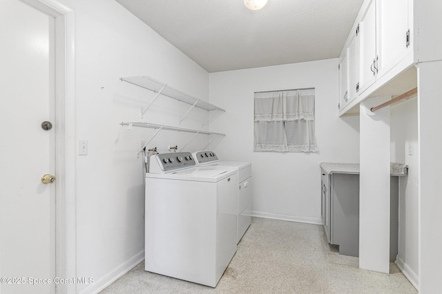 55 Yacht Haven Dr, Cocoa Beach, FL 32931 - laundry area featuring independent washer and dryer and cabinet space