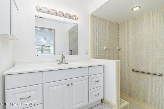 55 Yacht Haven Dr, Cocoa Beach, FL 32931 - full bathroom featuring vanity, walk in shower, and tile patterned flooring