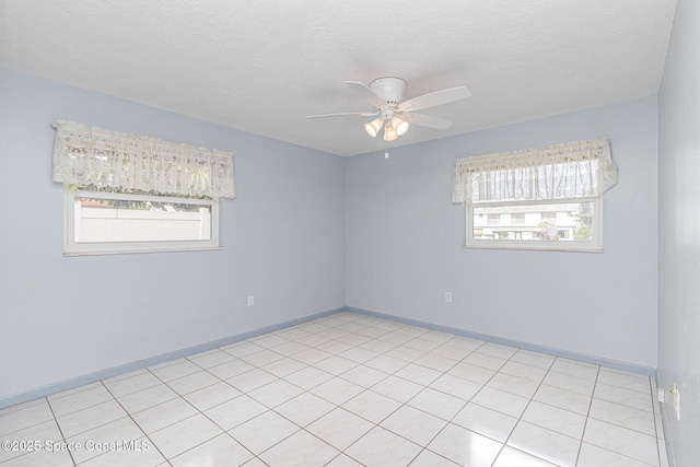 55 Yacht Haven Dr, Cocoa Beach, FL 32931 - spare room featuring a ceiling fan and a textured ceiling