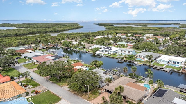 55 Yacht Haven Dr, Cocoa Beach, FL 32931 - aerial perspective of suburban area with a nearby body of water