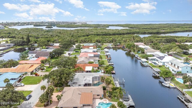 55 Yacht Haven Dr, Cocoa Beach, FL 32931 - aerial perspective of suburban area featuring a nearby body of water