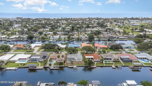 55 Yacht Haven Dr, Cocoa Beach, FL 32931 - aerial perspective of suburban area with a nearby body of water