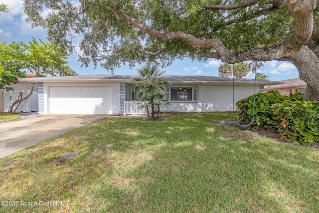 55 Yacht Haven Dr, Cocoa Beach, FL 32931 - ranch-style home featuring a garage, driveway, and stucco siding