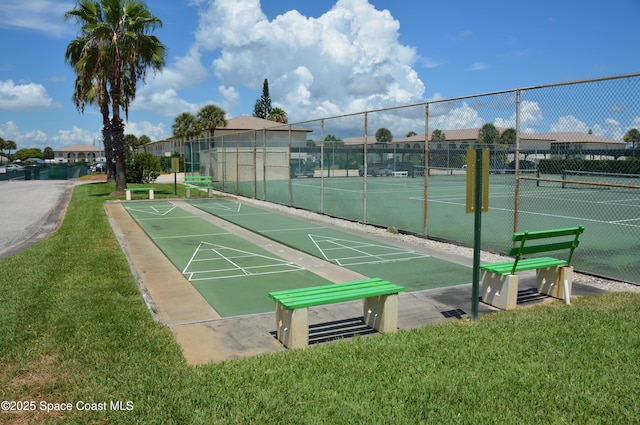 500 Palm Springs Blvd Unit 411, Indian Harbour Beach, FL 32937 - view of community with a tennis court and shuffleboard