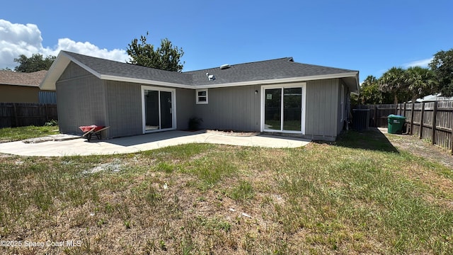 669 Vocelle Ave, Sebastian, FL 32958 - rear view of house featuring a patio area and a fenced backyard