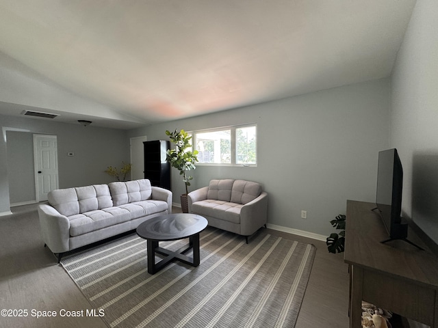 669 Vocelle Ave, Sebastian, FL 32958 - living room with lofted ceiling and wood finished floors