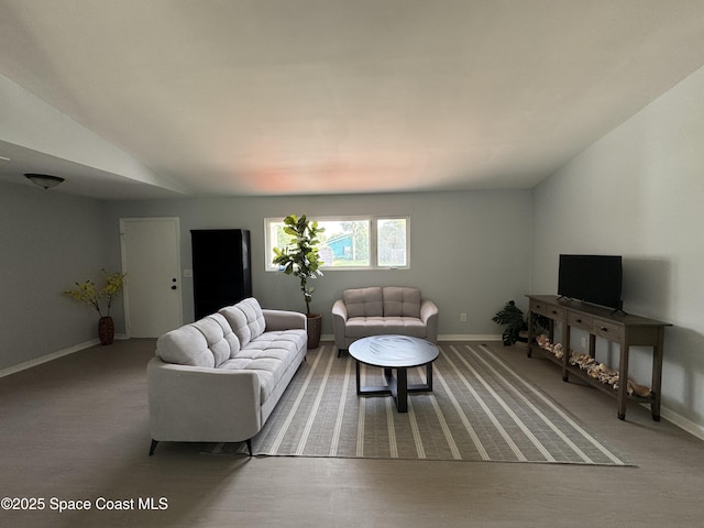 669 Vocelle Ave, Sebastian, FL 32958 - living room featuring lofted ceiling and carpet