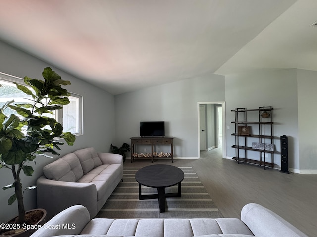 669 Vocelle Ave, Sebastian, FL 32958 - living room with lofted ceiling and wood finished floors