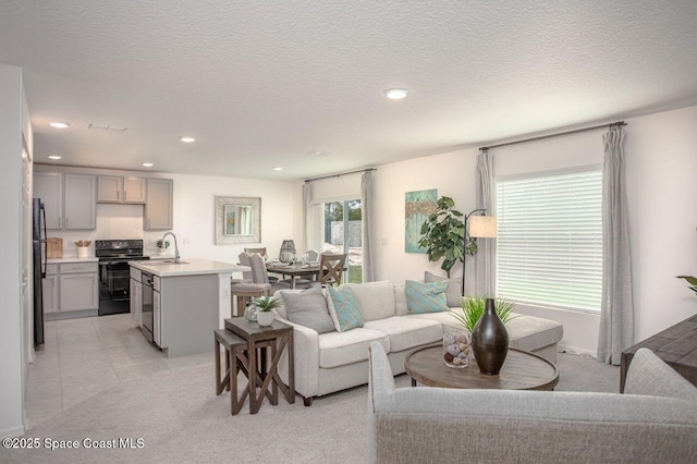 301 Latham St SE, Palm Bay, FL 32909 - living room featuring recessed lighting and light tile patterned floors