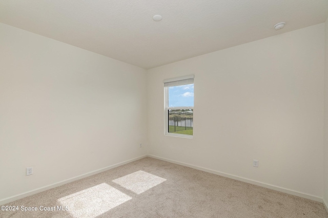 1811 Saxton Rd, Cocoa, FL 32926 - empty room featuring carpet flooring and a smoke detector