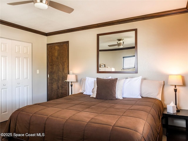 1277 S Orlando Ave Unit 4B, Cocoa Beach, FL 32931 - bedroom featuring crown molding, a ceiling fan, and a closet