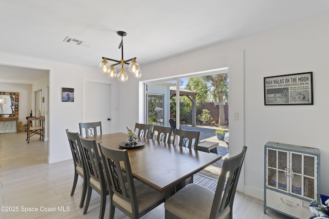 208 Atlantic Blvd, Indian Harbour Beach, FL 32937 - dining area with a chandelier and heating unit