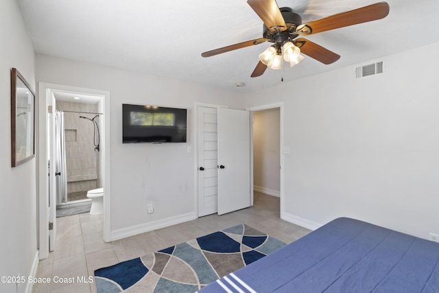 208 Atlantic Blvd, Indian Harbour Beach, FL 32937 - bedroom featuring light tile patterned floors, ceiling fan, and ensuite bathroom