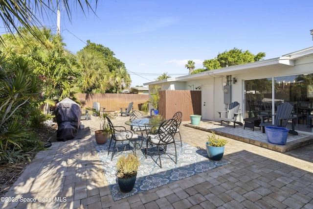 208 Atlantic Blvd, Indian Harbour Beach, FL 32937 - view of patio / terrace featuring outdoor dining space and area for grilling