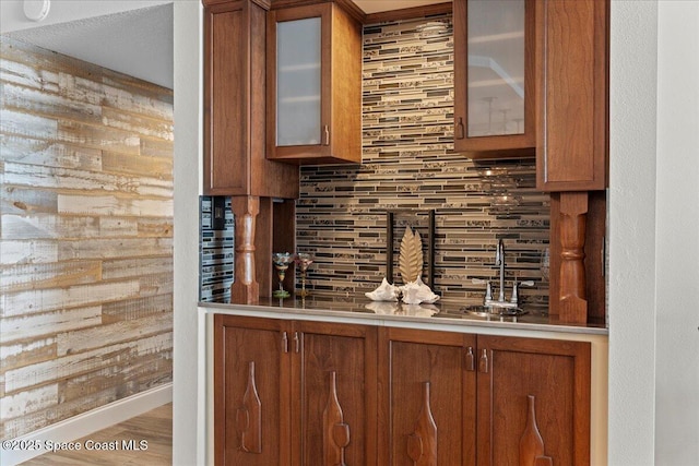 3221 S Atlantic Ave Unit 703, Cocoa Beach, FL 32931 - indoor bar featuring backsplash and wood finished floors