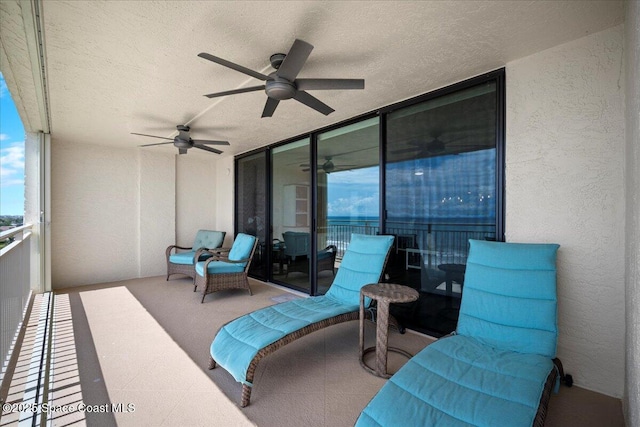 3221 S Atlantic Ave Unit 703, Cocoa Beach, FL 32931 - patio / terrace featuring ceiling fan