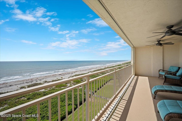 3221 S Atlantic Ave Unit 703, Cocoa Beach, FL 32931 - balcony featuring view of water and beach and ceiling fan