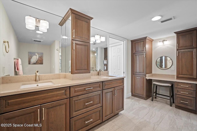 3221 S Atlantic Ave Unit 703, Cocoa Beach, FL 32931 - bathroom with double vanity and marble look tiles