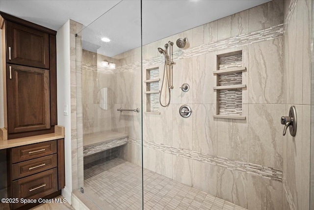 3221 S Atlantic Ave Unit 703, Cocoa Beach, FL 32931 - bathroom featuring a shower stall