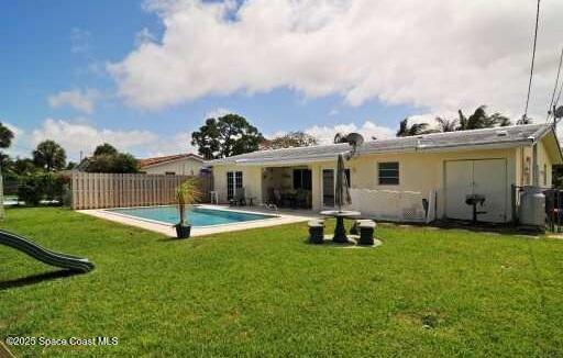1310 SW 9th Ter, Boca Raton, FL 33428 - rear view of property featuring a patio area and stucco siding