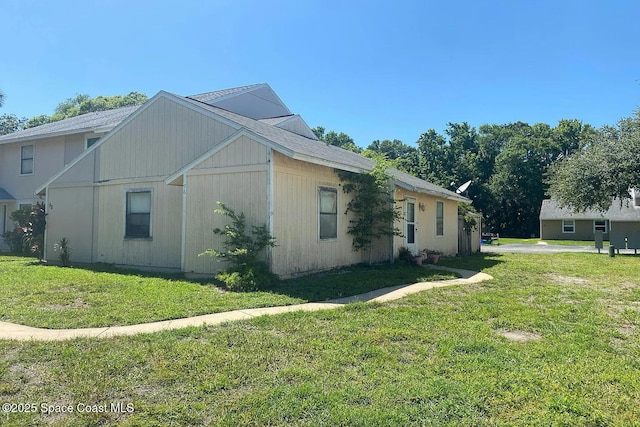 96 Tomoka Meadows Blvd, Ormond Beach, FL 32174 - view of property exterior featuring a lawn