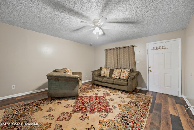 1515 Huntington Ln Unit 227, Rockledge, FL 32955 - living area featuring a ceiling fan, wood finished floors, and a textured ceiling