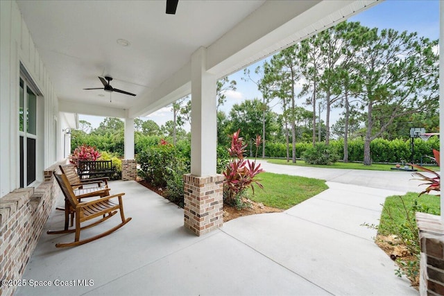 6190 Brabrook Ave, Grant, FL 32949 - covered porch with a ceiling fan
