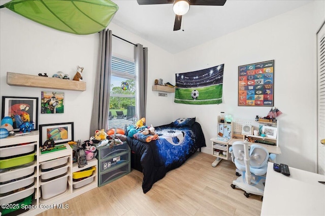 6190 Brabrook Ave, Grant, FL 32949 - bedroom with wood finished floors and a ceiling fan