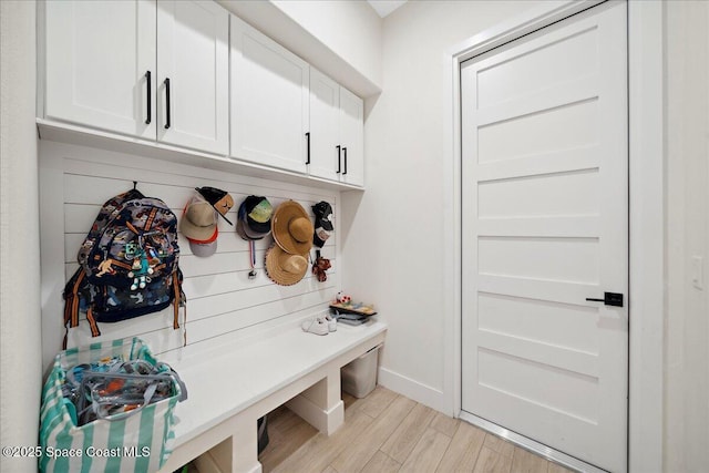 6190 Brabrook Ave, Grant, FL 32949 - mudroom featuring light wood-style flooring and baseboards