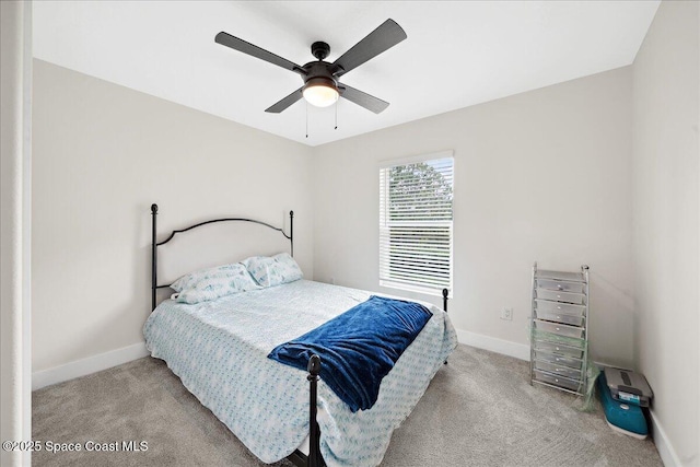 6190 Brabrook Ave, Grant, FL 32949 - carpeted bedroom with baseboards and ceiling fan