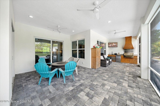 6190 Brabrook Ave, Grant, FL 32949 - sunroom featuring a textured ceiling and recessed lighting