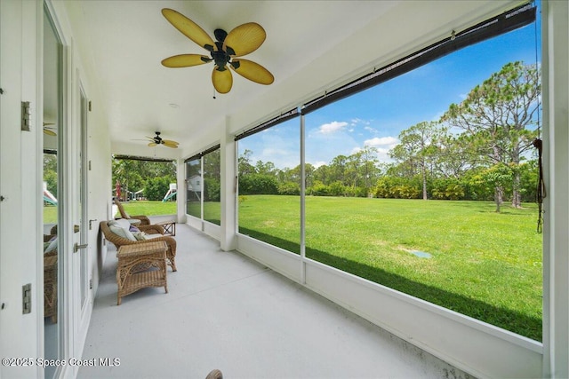 6190 Brabrook Ave, Grant, FL 32949 - sunroom with ceiling fan and view of scattered trees