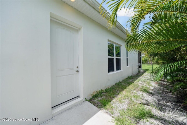 6190 Brabrook Ave, Grant, FL 32949 - property entrance with stucco siding