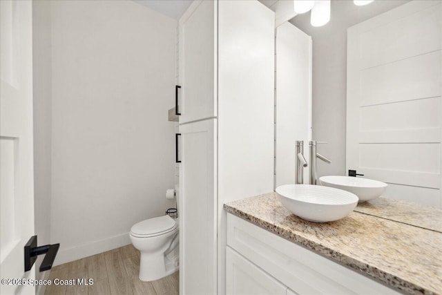 6190 Brabrook Ave, Grant, FL 32949 - bathroom with vanity and wood finished floors