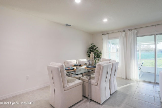 3147 San Salvador Ave, Palm Bay, FL 32909 - dining space with recessed lighting, plenty of natural light, and light tile patterned floors