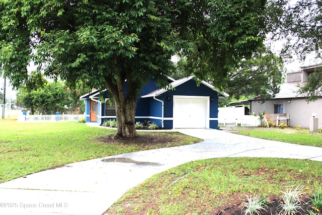 1001 Bernice Rd, Rockledge, FL 32955 - view of front facade with driveway and an attached garage