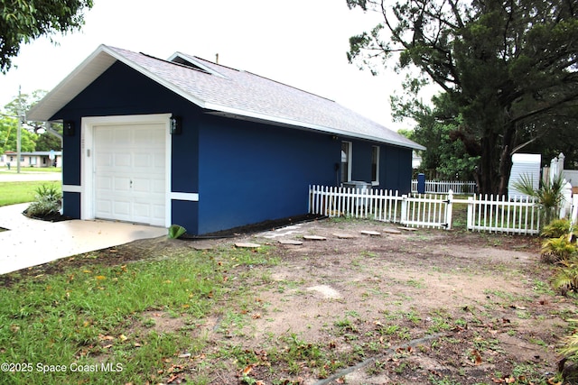 1001 Bernice Rd, Rockledge, FL 32955 - garage featuring concrete driveway