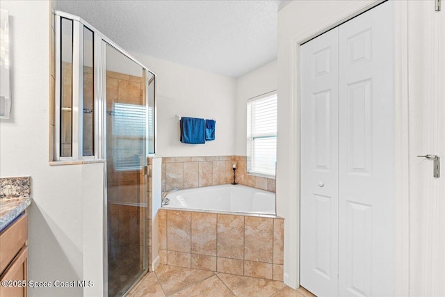 5575 Hemsing St, Cocoa, FL 32927 - full bath featuring a closet, vanity, a bath, and a shower stall