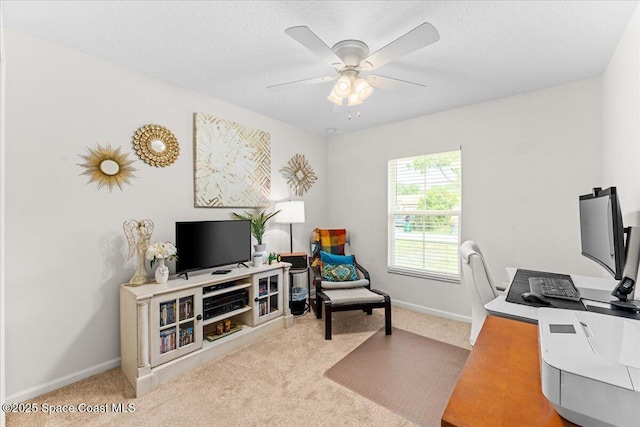 5575 Hemsing St, Cocoa, FL 32927 - office area with carpet flooring, ceiling fan, and a textured ceiling