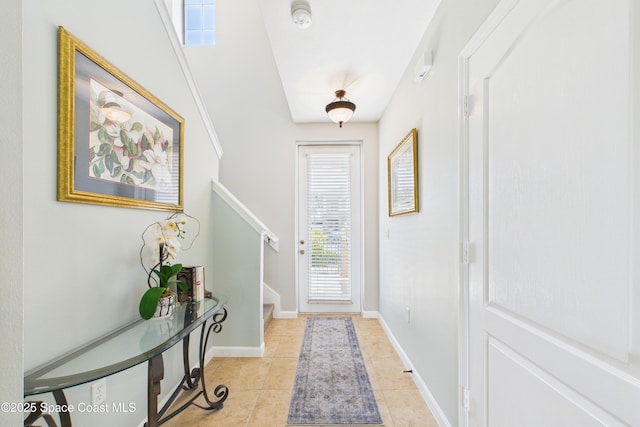 152 Clemente Dr, Satellite Beach, FL 32937 - doorway to outside featuring light tile patterned floors and stairs