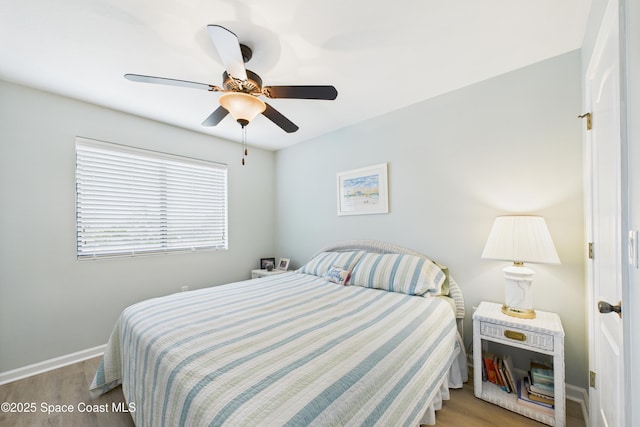 152 Clemente Dr, Satellite Beach, FL 32937 - bedroom with wood finished floors and a ceiling fan